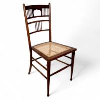 E. W. Godwin or H. W. Batley, probably made for Collinson & Lock. An Aesthetic Movement walnut side chair - Thumbnail 1
