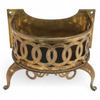 Birmingham Guild of Handicraft Attributed, a Gilded Semi-circular Brass Planter