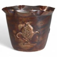 Joseph Sankey & Sons. A Large Arts & Crafts Copper Planter with Embossed Flower Pod