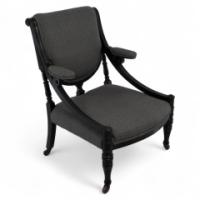 A Stylish Aesthetic Movement Ebonised & Professionally Upholstered Armchair with Sweeping Side Rails