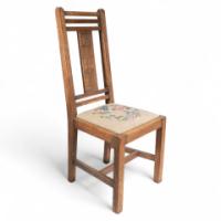 Liberty & Co., Arts & Crafts Oak Chair with Carved Rose Decoration to the Back