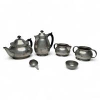 Liberty & Co., an Arts & Crafts Six Piece Pewter Tudric Tea Set