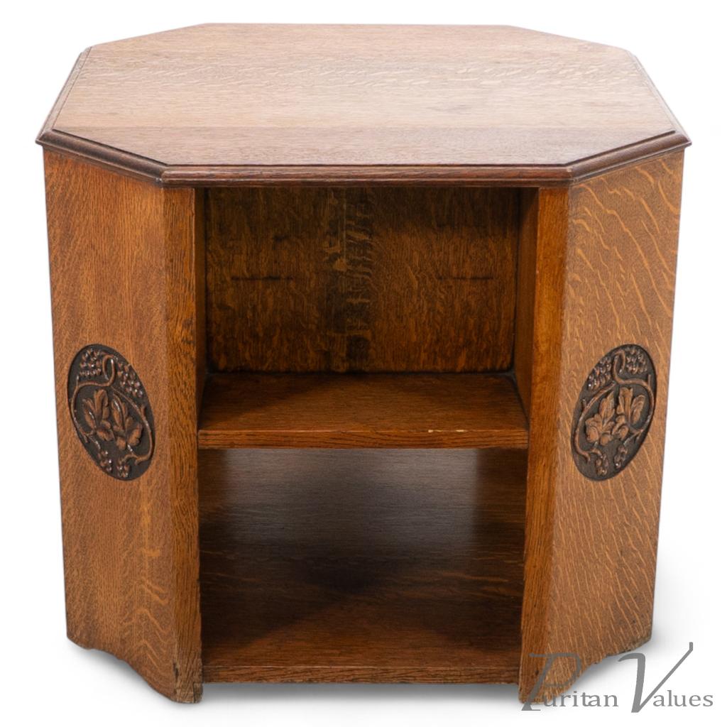 5391_heals-an-arts-crafts-octagonal-oak-bookcase-side-table-with-carved-decoration