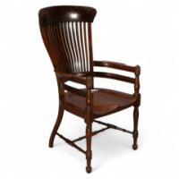 E. W. Godwin Attributed, for James Peddle or Smee. A Tall Back Serpentine Shape Walnut Armchair