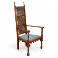 Dr. C. Dresser Attributed, for the Art Furniture Alliance. A Moorish Style Walnut Armchair