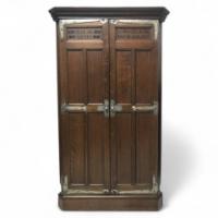 Liberty & Co. Attributed, an Arts Crafts Oak corner cupboard - Thumbnail 1