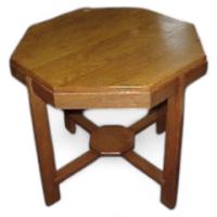 An Arts & Crafts Oak Octagonal Centre or Side Table with Lower Central Shelf United by Cross Stretchers