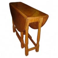 Albert Eagleman Jeffray. An Oak drop leaf dining table - Thumbnail 1