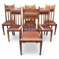 Liberty & Co. Attributed, a set of seven Arts & Crafts Oak dining chairs - Thumbnail 1