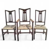 Liberty & Co. A set of three rush seat dining chairs in the manner of C. F. A Voysey - Thumbnail 1
