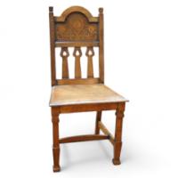 Shapland & Petter. An Arts & Crafts Oak chair with arched top and wonderful Peacock inlays - Thumbnail 1