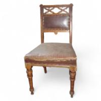 A Well-Crafted Set of Six Gothic Revival Oak Dining Chairs