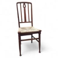 An Arts & Crafts Rush Seat Side Chair with Upside Down Pierced Heart