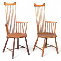 Liberty & Co. A pair of beech high comb back elbow chairs - Thumbnail 1