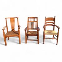 Arthur Simpson. An armchair with shaped back and original ratten drop - Thumbnail 1