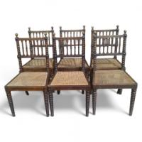 E. W. Godwin Attributed, a set of six simulated rosewood and caned dining chairs - Thumbnail 1