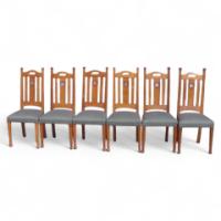 G. M. Ellwood for J. S. Henry. A set of six Arts & Crafts Oak dining chairs inlaid with pewter and Ebony hearts - Thumbnail 1