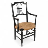 Liberty & Co., an English Aesthetic Movement Ebonised Armchair with Seagrass Seat - Thumbnail 1