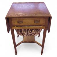 A Glasgow Style Oak sewing table with two drop down leaves, - Thumbnail 1