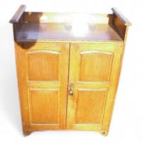Wylie & Lochhead. Arts & Crafts boot Oak cupboard - Thumbnail 1