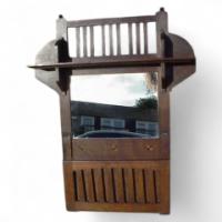Leonard Wyburd for Liberty & Co. Rare Liberty & Co. Arts & Crafts Oak wall mirror/paper rack - Thumbnail 1