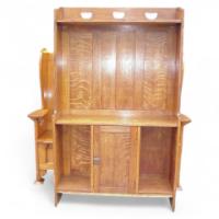 Liberty & Co. A Oak bookcase with squashed heart - Thumbnail 1