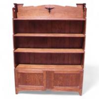 Liberty & Co. A Oak Bookcase with a pair of cupboards - Thumbnail 1