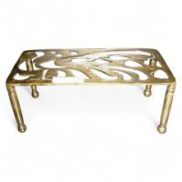 Aesthetic Movement Brass Trivet with Peacock Fret Work, on Turned Legs - Thumbnail 1