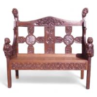 A Celtic Arts & Crafts carved Oak settle with carved dragons to the tops - Thumbnail 1