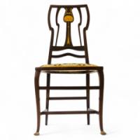 Liberty & Co. An Arts Crafts inlaid mahogany side chair. - Thumbnail 1