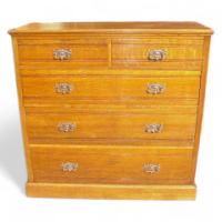 A Well-Crafted Arts & Crafts Oak Chest of Drawers with Stylised Copper Handles
