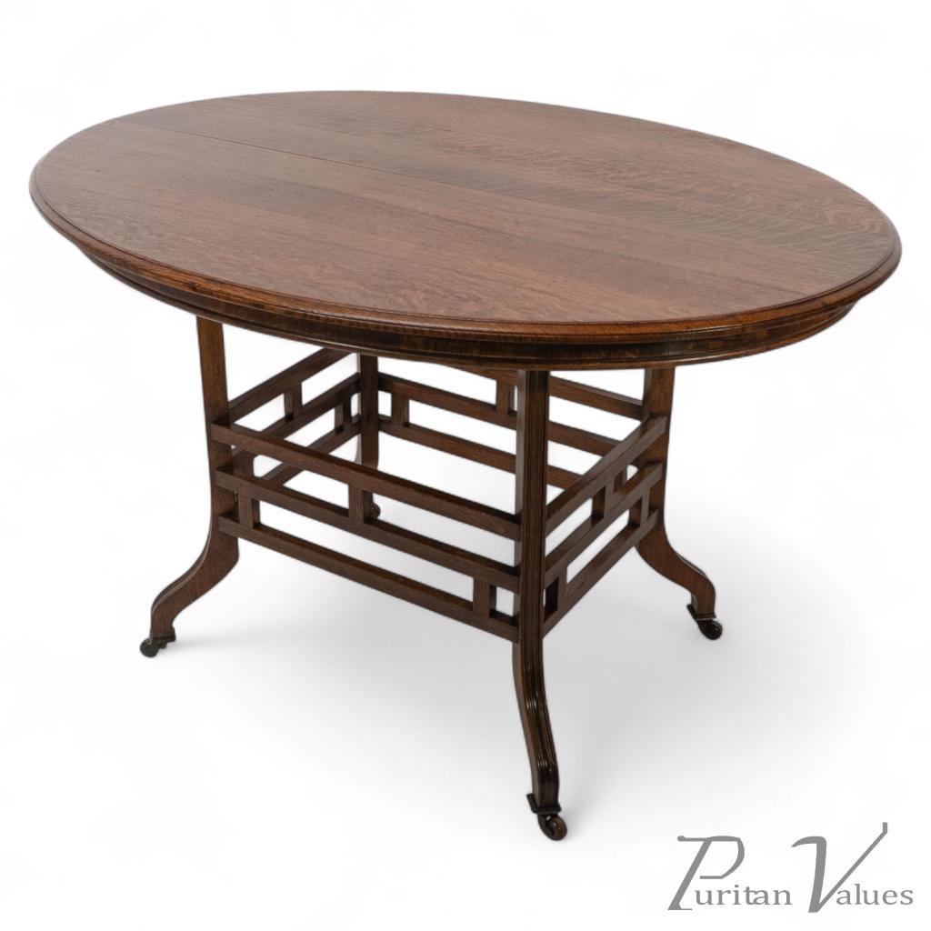lamb-of-manchester-stamped-lambs-rare-anglo-japanese-oak-oval-centre-table-1-medium-size
