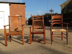 Arthur Simpson. An armchair with shaped back and original ratten drop - Thumbnail 2
