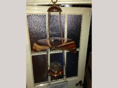 W. A. S. Benson. A brass and copper hanging tiered oil lamp with petal shade to the top. - Thumbnail 1