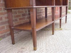 E W Godwin for Collinson and Lock. An eight leg Anglo-Japanese sideboard with brass sabots - Thumbnail 14