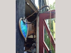 A pair of Arts & Crafts copper wall lights with peacock blue enamel heart shaped back plates. - Thumbnail 3