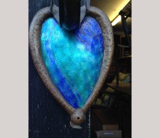 A pair of Arts & Crafts copper wall lights with peacock blue enamel heart shaped back plates. - Thumbnail 5