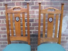 G. M. Ellwood for J. S. Henry. A set of six Arts & Crafts Oak dining chairs inlaid with pewter and Ebony hearts - Thumbnail 3