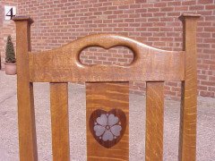 G. M. Ellwood for J. S. Henry. A set of six Arts & Crafts Oak dining chairs inlaid with pewter and Ebony hearts - Thumbnail 7