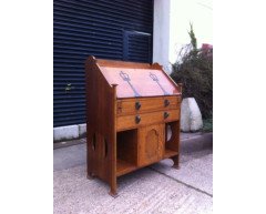 J S Henry. An Arts and Crafts oak bureau with elongated brass handles - Thumbnail 2