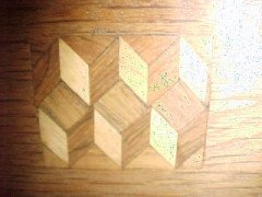 In the style of John Ednie. An Arts & Crafts Oak Inlaid Extending Dining Table. - Thumbnail 2