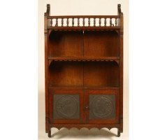 E. W. Godwin attributed. an Oak Hanging Bookcase, with Portrait Medallion Roundels in Moulded Vulcanite - Thumbnail 2