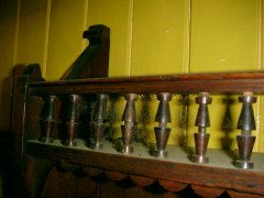 E. W. Godwin attributed. an Oak Hanging Bookcase, with Portrait Medallion Roundels in Moulded Vulcanite - Thumbnail 7