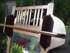 Leonard Wyburd for Liberty & Co. Rare Liberty & Co. Arts & Crafts Oak wall mirror/paper rack - Thumbnail 2