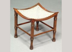 Liberty & Co. A stained beech Thebes stool - Thumbnail 1