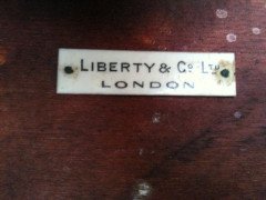 Liberty & Co. A pair of beech high comb back elbow chairs - Thumbnail 7