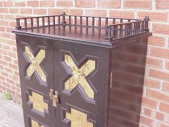 Dr. Christopher Dresser Attributed, an ebonised music cabinet, with six painted panels Attributed, to Moyr Smith - Thumbnail 4