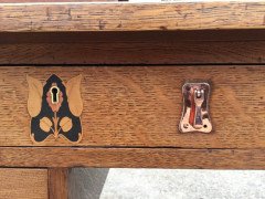 G. M. Ellwood for J. S. Henry. An Arts Crafts Oak desk inlaid with stylised floral panels - Thumbnail 12