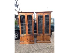 A pair of Arts & Crafts Oak glazed bookcases over a lower cupboard - Thumbnail 2