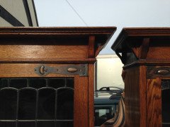 A pair of Arts & Crafts Oak glazed bookcases over a lower cupboard - Thumbnail 4